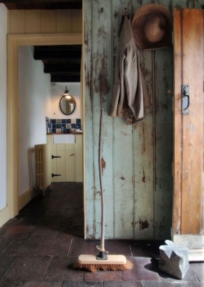 View into the bathroom, from kitchen. Photo by Under the Thatch