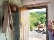 View of the garden from the kitchen. Photo by Under the Thatch