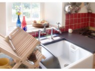 View of the garden from kitchen. Photo by Under the Thatch