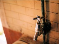 Pre renovation bathroom tap. Photo by Ben Stammers